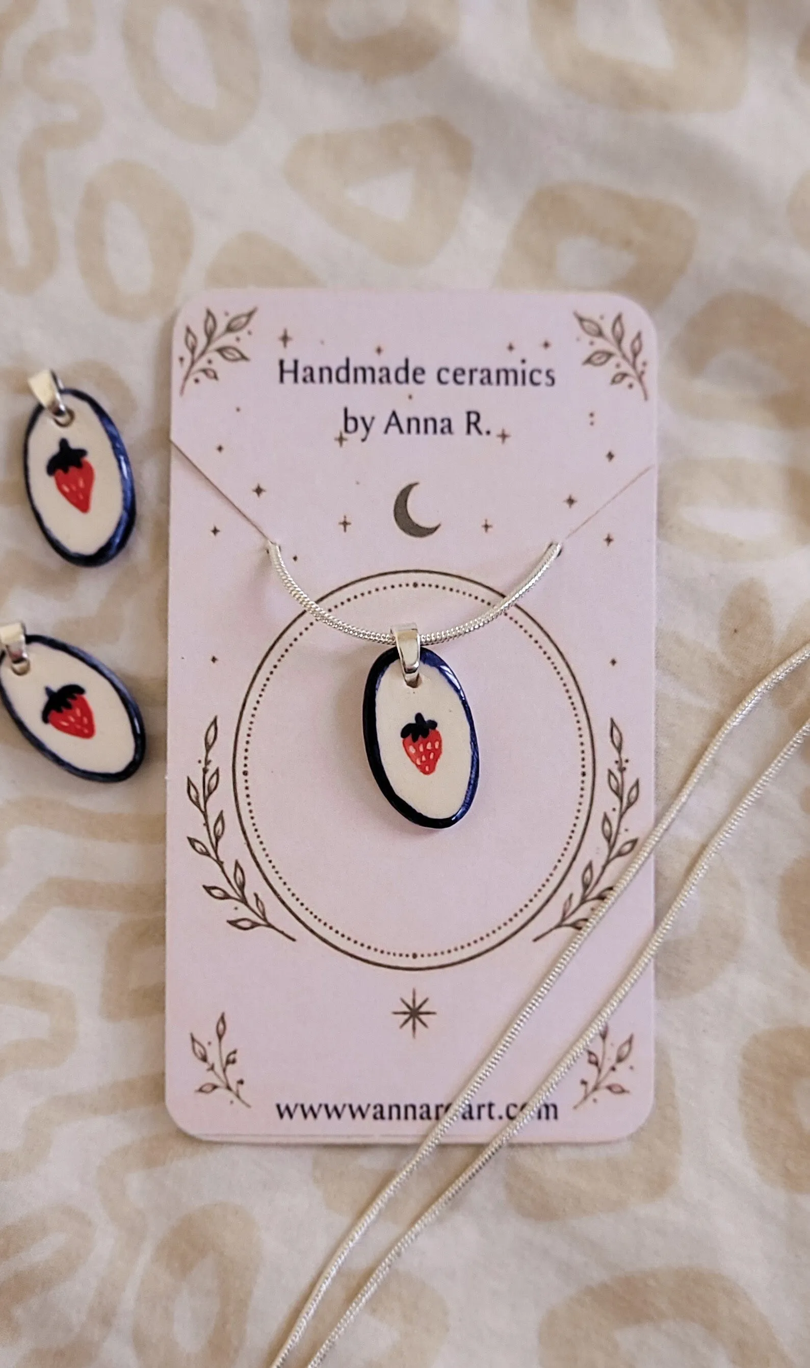 Strawberry ceramic pendant on silver chain