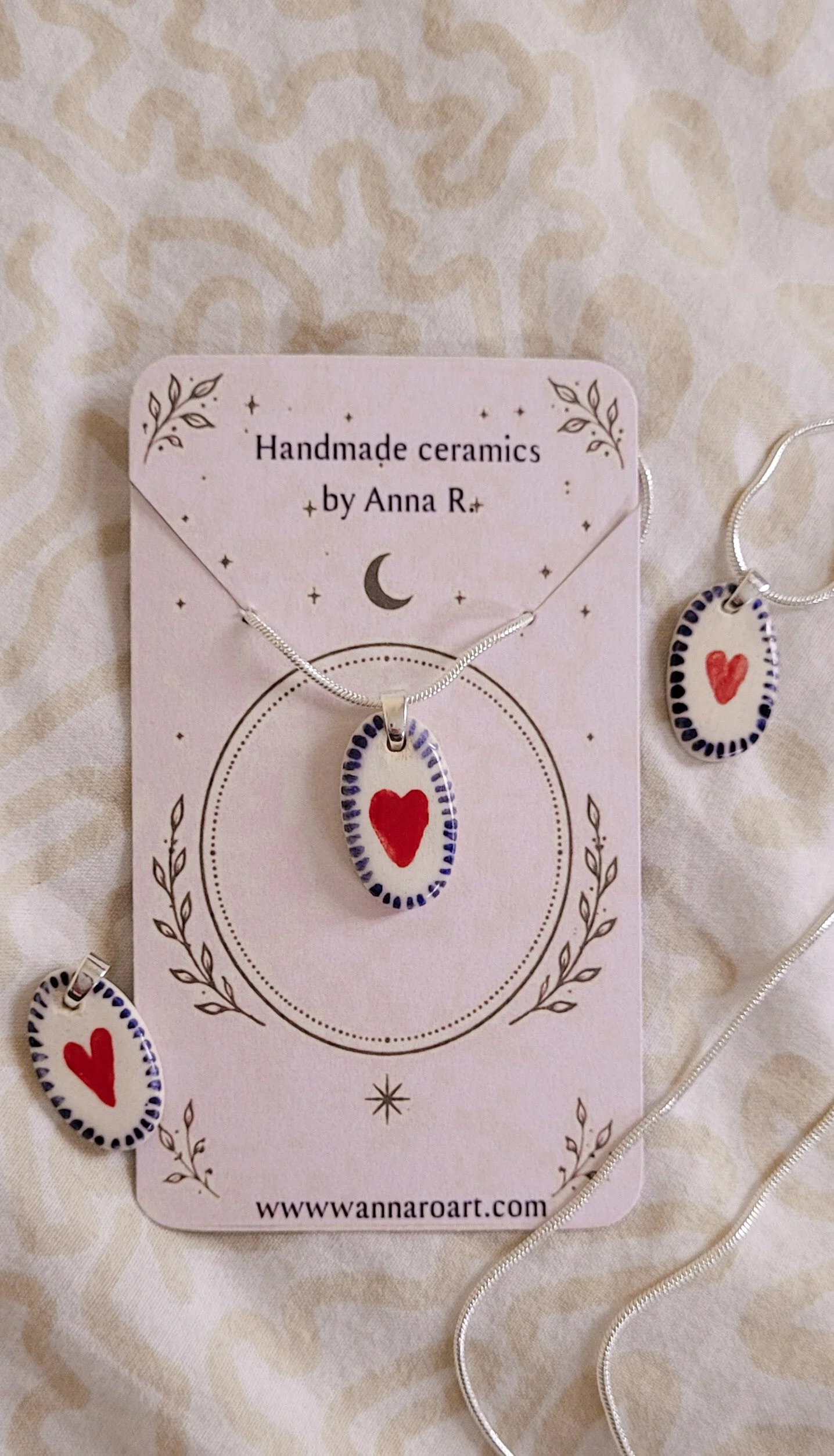 Heart ceramic pendant on silver chain