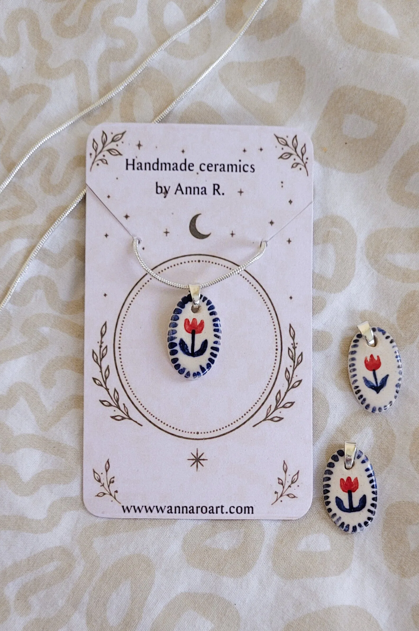 Flower ceramic pendant on silver chain