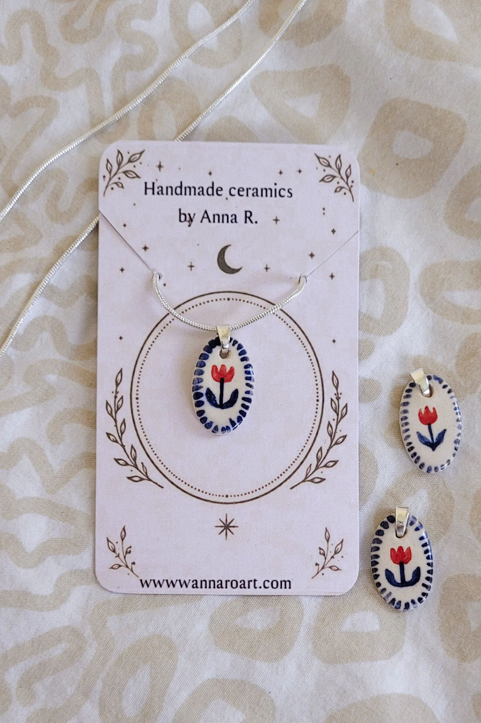 Flower ceramic pendant on silver chain