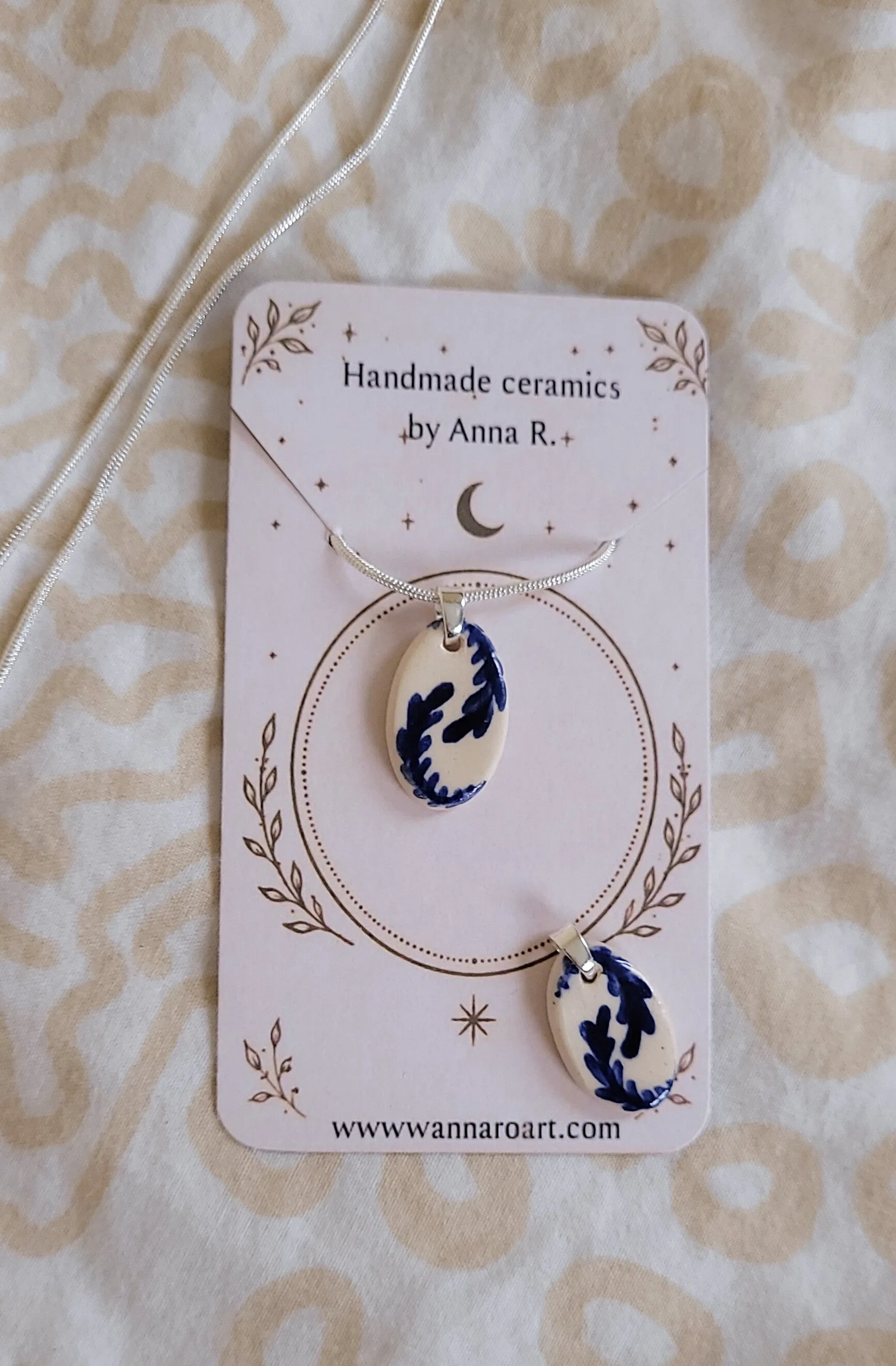 Botanical Motif ceramic pendant on silver chain
