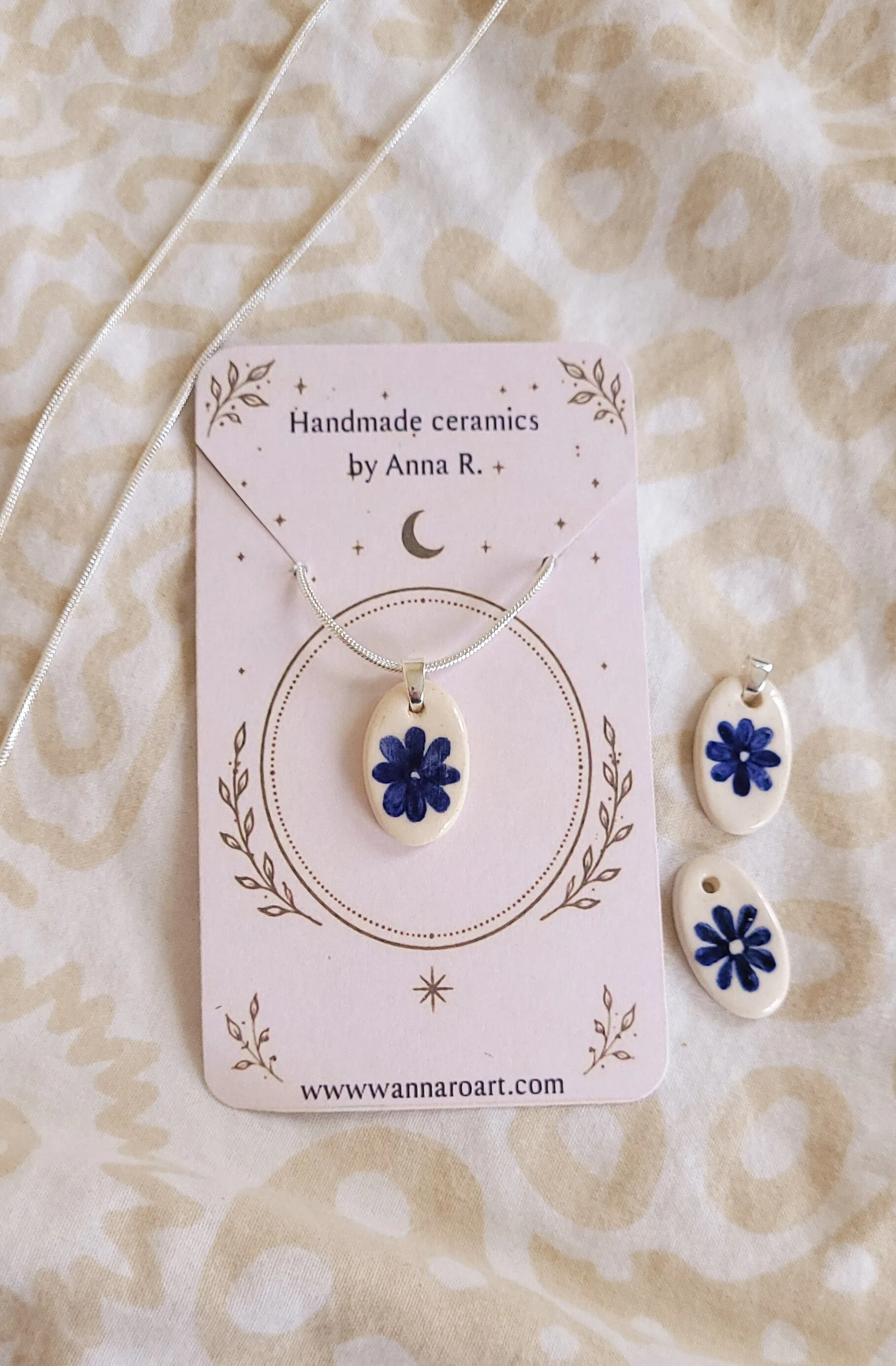 Blue Flower ceramic pendant on silver chain