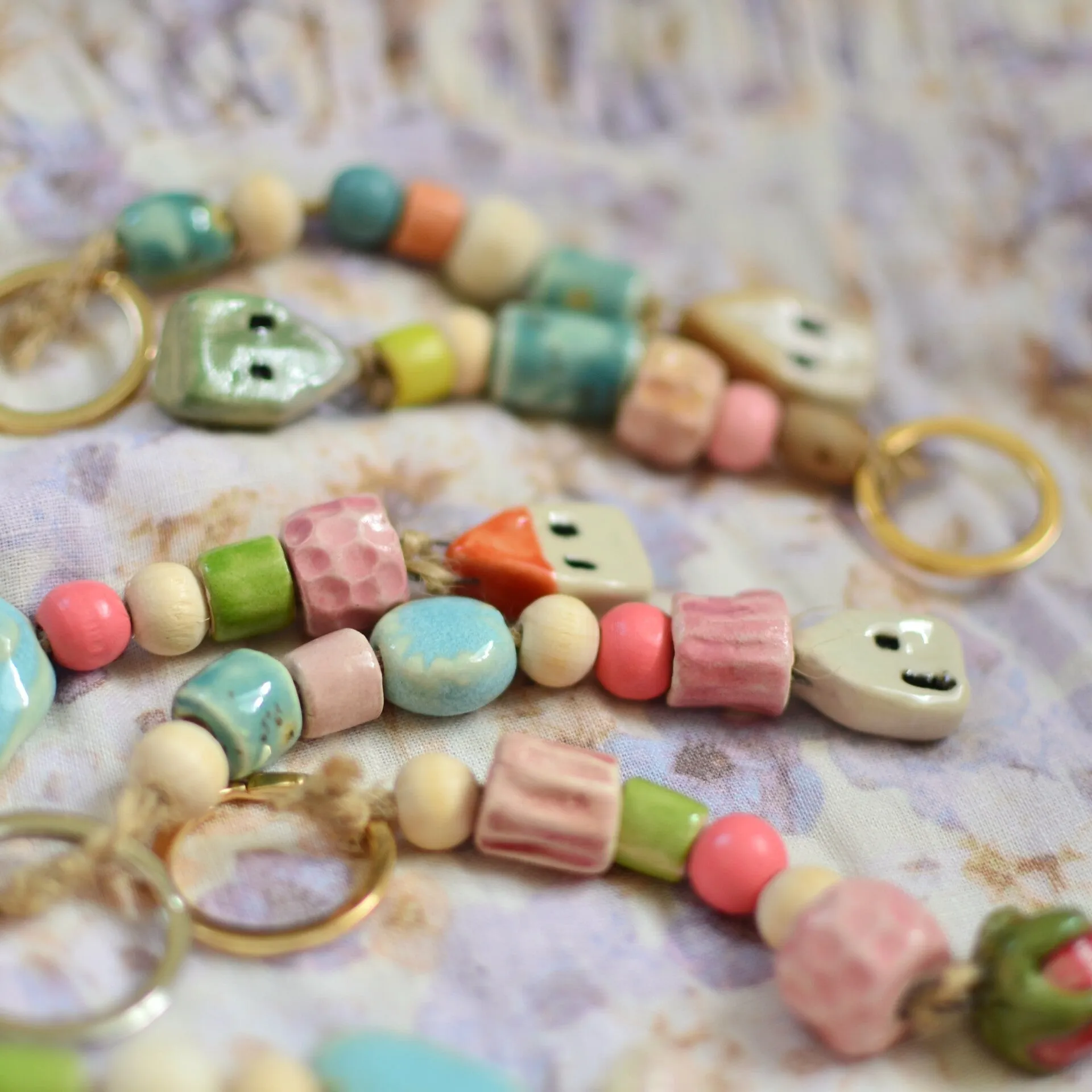 Handmade ceramic bead keychains — souvenirs for shops